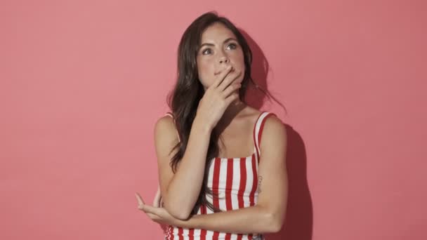 Pensive Pretty Brunette Woman Having Idea While Looking Pink Background — Stock Video