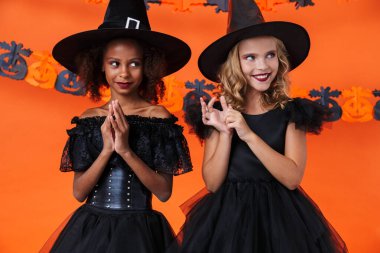 Image of nice multinational girls smiling and standing together