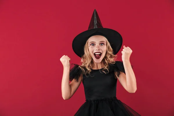 Surprised little girl witch in carnival halloween costume — 스톡 사진