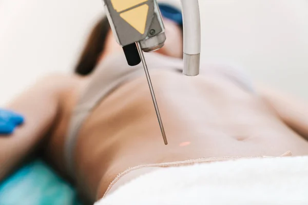 Photo of caucasian woman getting laser epilation procedure — Stock Photo, Image