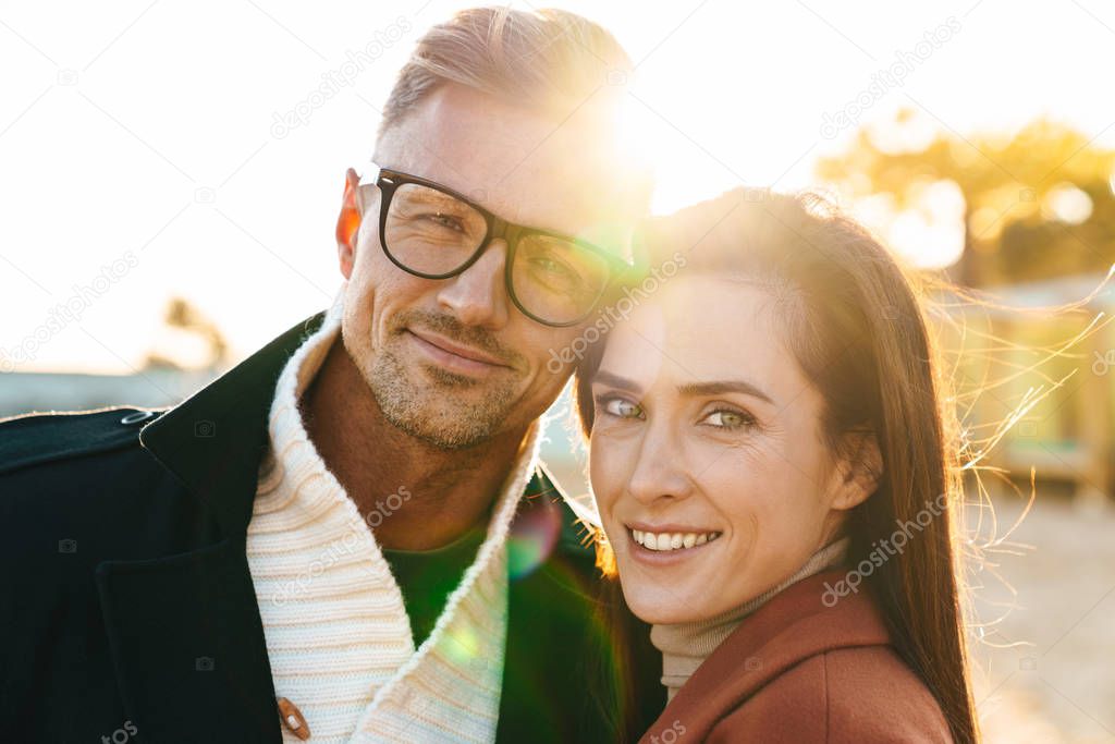 Beautiful adult loving couple walking outdoors