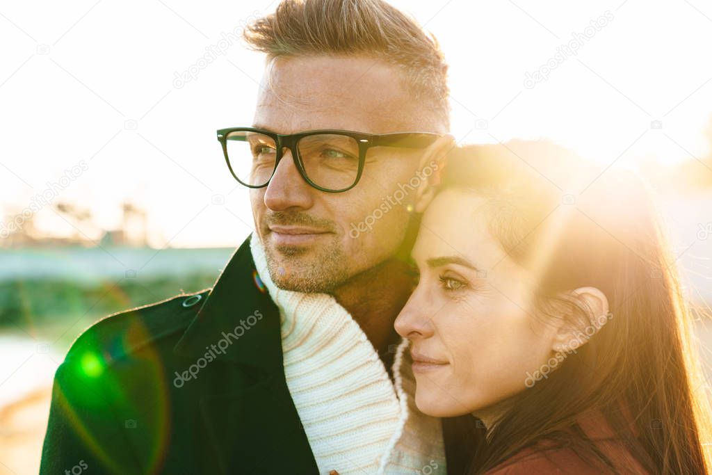 Beautiful adult loving couple walking outdoors