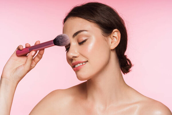 Beauty portrait of a beautiful young topless brunette woman