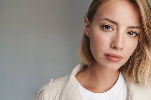 Close up of a lovely young blonde short haired woman — 스톡 사진