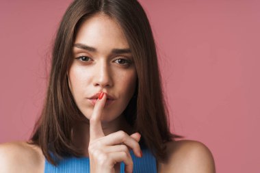 Close up of an attractive young short brown haired woman