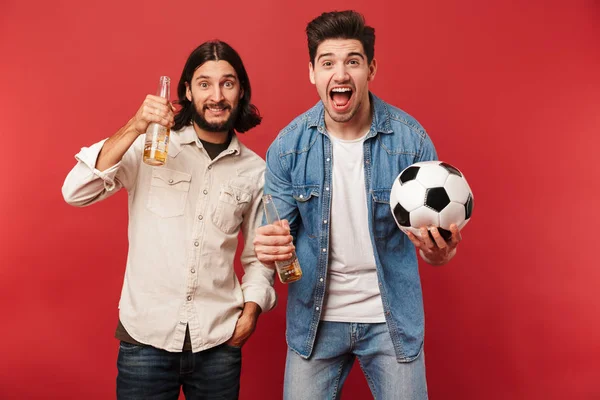 Photo of excited guys fans holding beers and soccer ball — ストック写真
