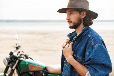 Close up of a handsome young man wearing casual outfit