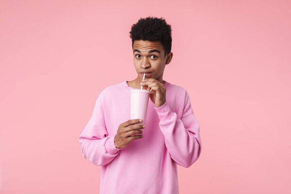 Portrait of a smiling african teenager boy wearing pullower