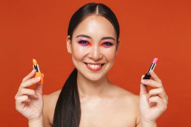 Beauty portrait of an attractive young topless asian woman
