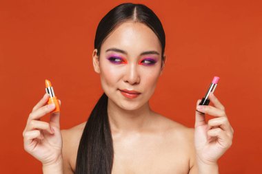 Beauty portrait of an attractive young topless asian woman