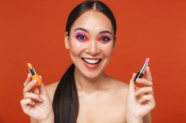Beauty portrait of an attractive young topless asian woman
