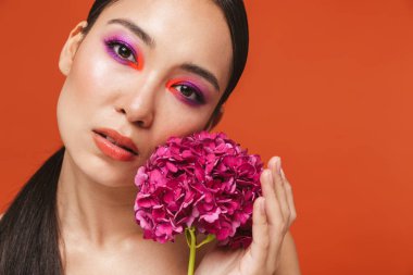 Beauty portrait of an attractive young topless asian woman