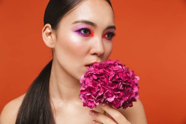 Beauty portrait of an attractive young topless asian woman