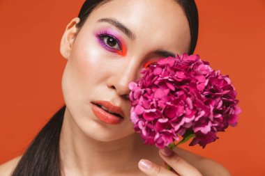 Beauty portrait of an attractive young topless asian woman