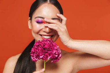 Beauty portrait of an attractive young topless asian woman