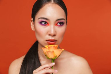 Beauty portrait of an attractive young topless asian woman