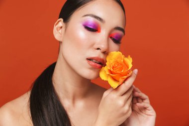 Beauty portrait of an attractive young topless asian woman