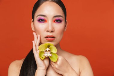 Beauty portrait of an attractive young topless asian woman