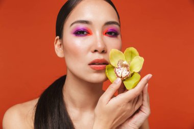 Beauty portrait of an attractive young topless asian woman