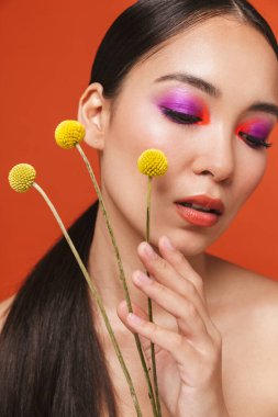Beauty portrait of an attractive young topless asian woman