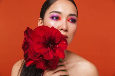 Beauty portrait of an attractive young topless asian woman