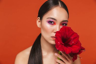 Beauty portrait of an attractive young topless asian woman