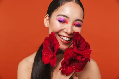 Beauty portrait of an attractive young topless asian woman