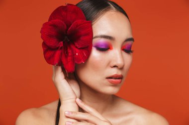 Beauty portrait of an attractive young topless asian woman