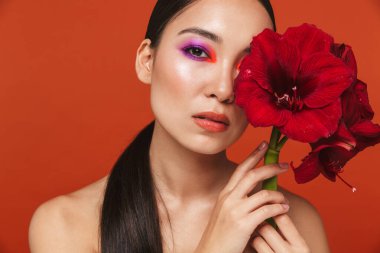 Beauty portrait of an attractive young topless asian woman