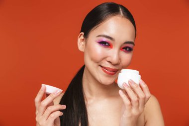 Beauty portrait of an attractive young topless asian woman