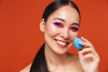 Beauty portrait of an attractive young topless asian woman