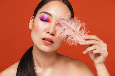 Beauty portrait of an attractive young topless asian woman