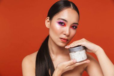Beauty portrait of an attractive young topless asian woman
