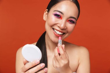 Beauty portrait of an attractive young topless asian woman