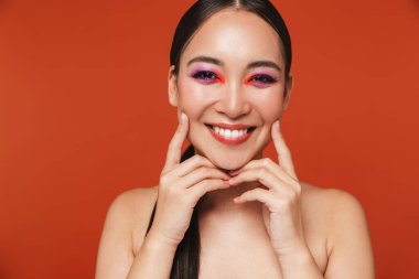Beauty portrait of an attractive young topless asian woman
