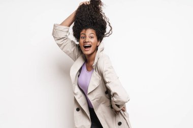 Cheerful playful attractive young african woman