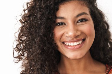 Close up of an attractive cheerful young african woman