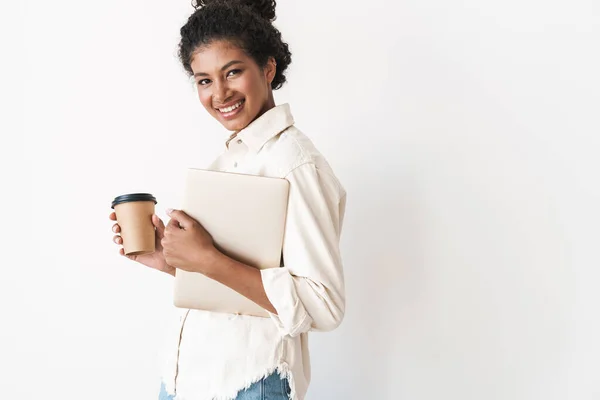 Smiling lovely stylish african woman holding laptop computer — Stock Photo, Image