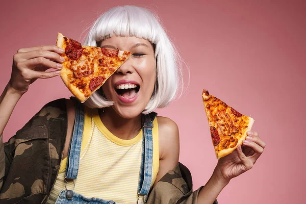 Image of young asian girl wearing white wig having fun and eatin — Stock Photo, Image