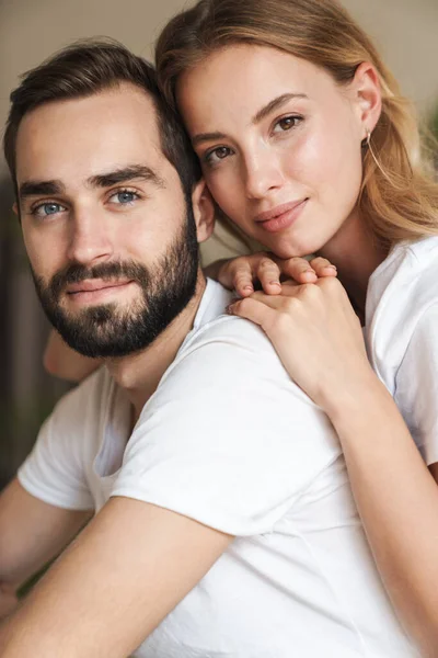 Optimistic loving couple indoors at home. — Stockfoto