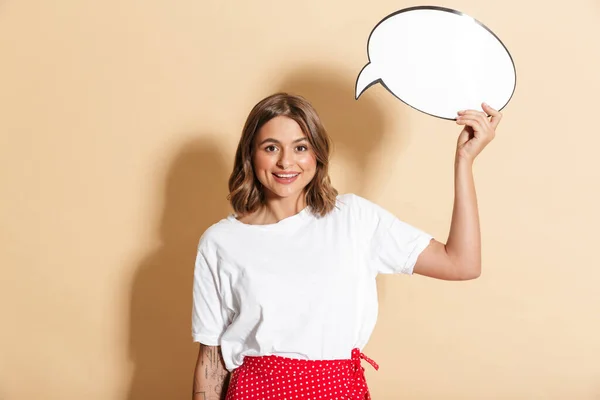 Image Beautiful Woman Red Skirt Smiling Holding Blank Thought Bubble — Stockfoto