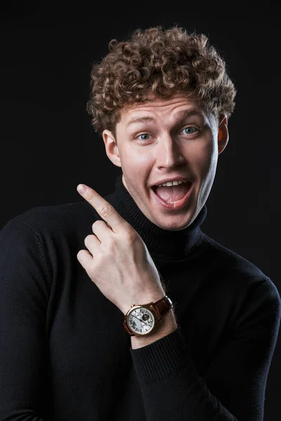 Excited Young Man Wearing Turtleneck Standing Isolated Infront Black Background — Stock Photo, Image