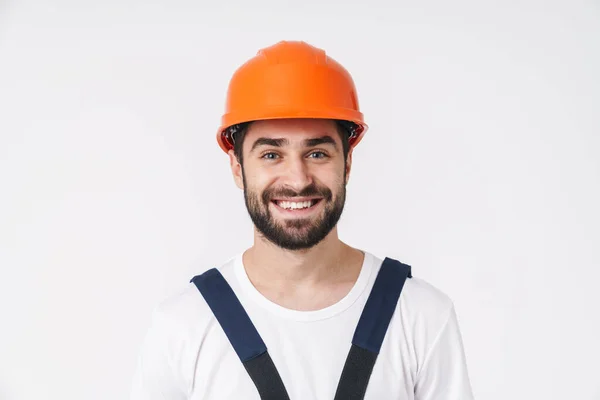 Imagen Feliz Joven Constructor Alegre Casco Posando Aislado Sobre Fondo — Foto de Stock