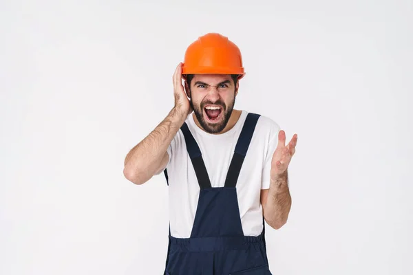 Foto Emocional Gritando Estressante Jovem Construtor Capacete Posando Isolado Sobre — Fotografia de Stock