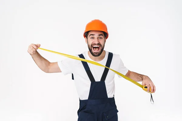 Foto Positivo Feliz Chocado Jovem Construtor Capacete Posando Isolado Sobre — Fotografia de Stock