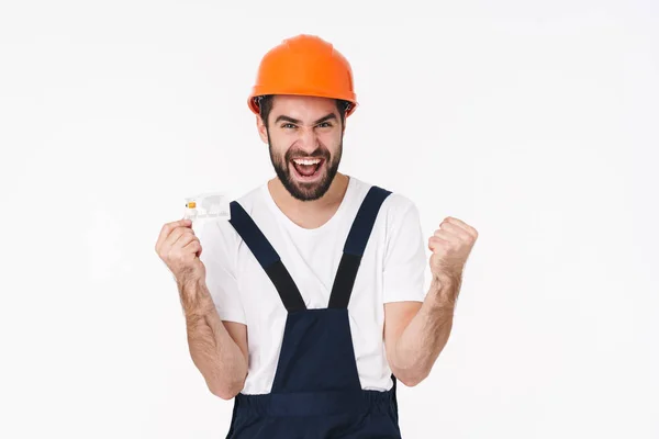 Foto Joven Constructor Emocional Casco Aislado Sobre Fondo Pared Blanca — Foto de Stock