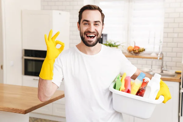 Image Young Optimistic Positive Man Househusband Indoors Showing Okay Gesture — Stock Photo, Image