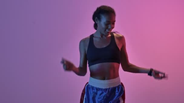 Happy African Sports Woman Dancing Looking Camera Isolated Led Flashlights — Stock Video