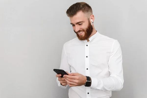 Portrait Attractive Handsome Young Businessman Standing Gray Background Using Mobile — Stock Photo, Image