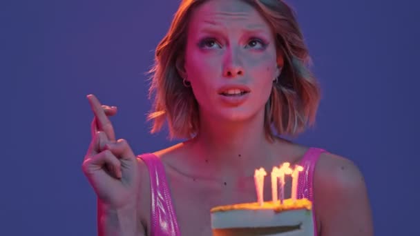 Close Beautiful Young Birthday Girl Making Wish While Holding Cake — Stock Video